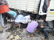 Mangaluru: Lorry overturns spilling tonnes of cashew nuts onto street.